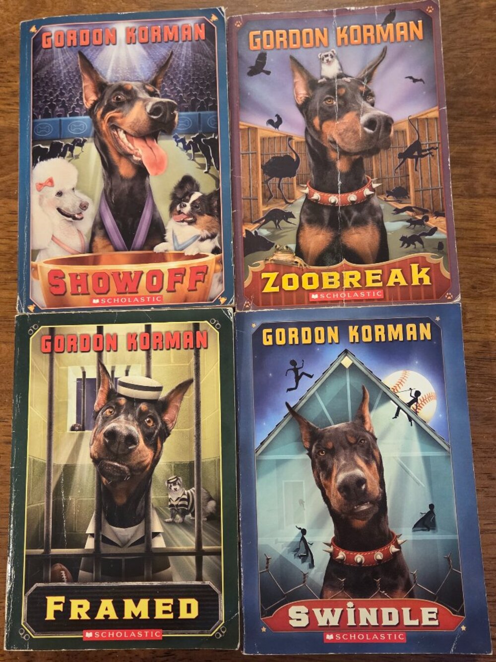 Gordon Korman Swindle Series 4-Book Paperback Lot - Swindle, Zoobreak, Framed, S